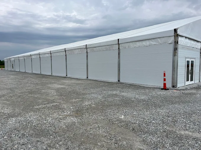 Engineered clear-span temporary and semi-permanent structures used for industrial operations