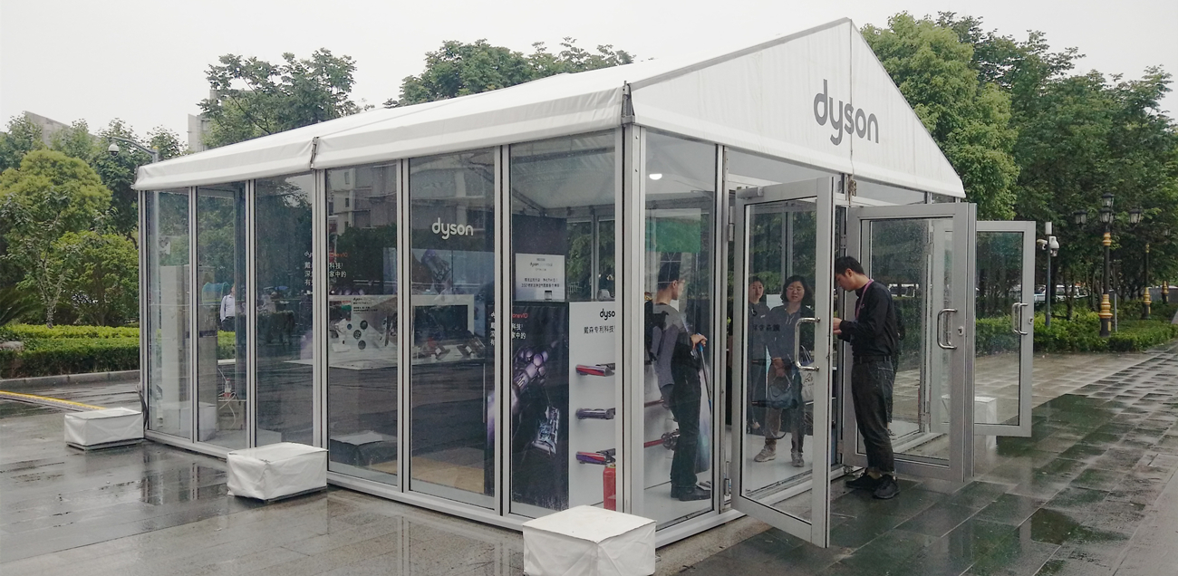 Temporary pop-up retail structure for a branded seasonal experience