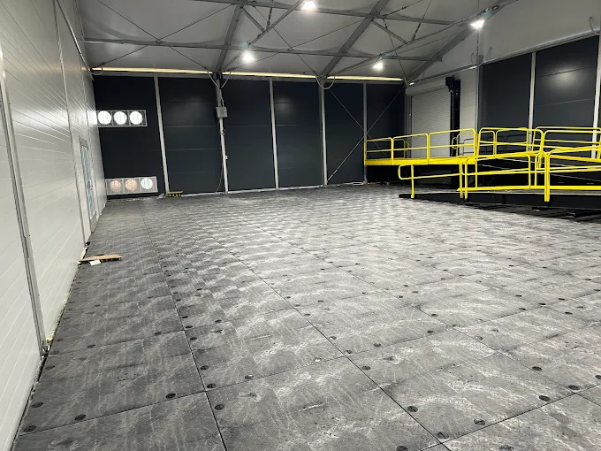 Temporary loading dock structure for industrial operations